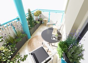 widok balkonu z donicami w koło barierki i nasadzeniami. widać stolik i fotel